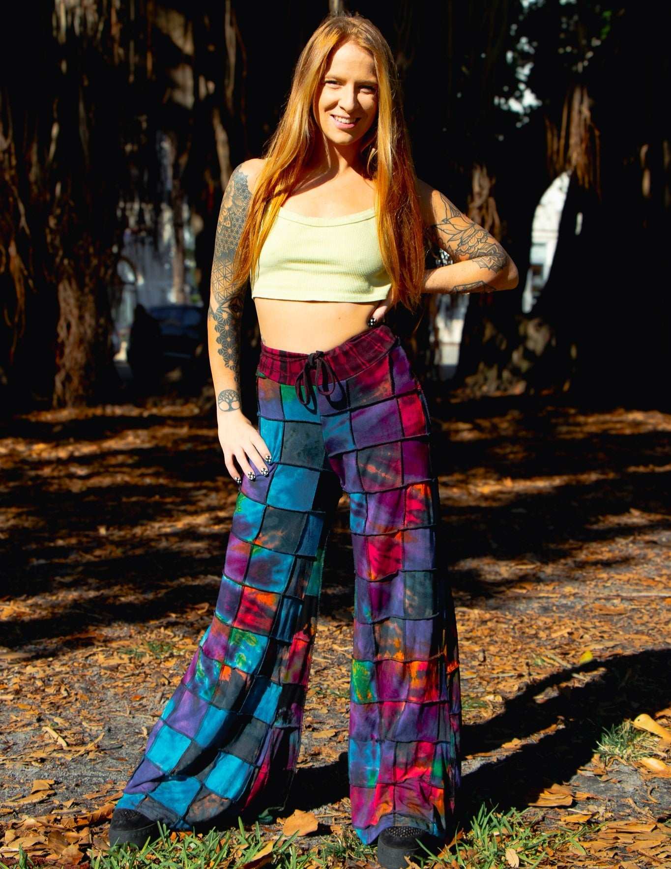 Handcrafted palazzo pants with vibrant patterns, 95% rayon, drawstring.