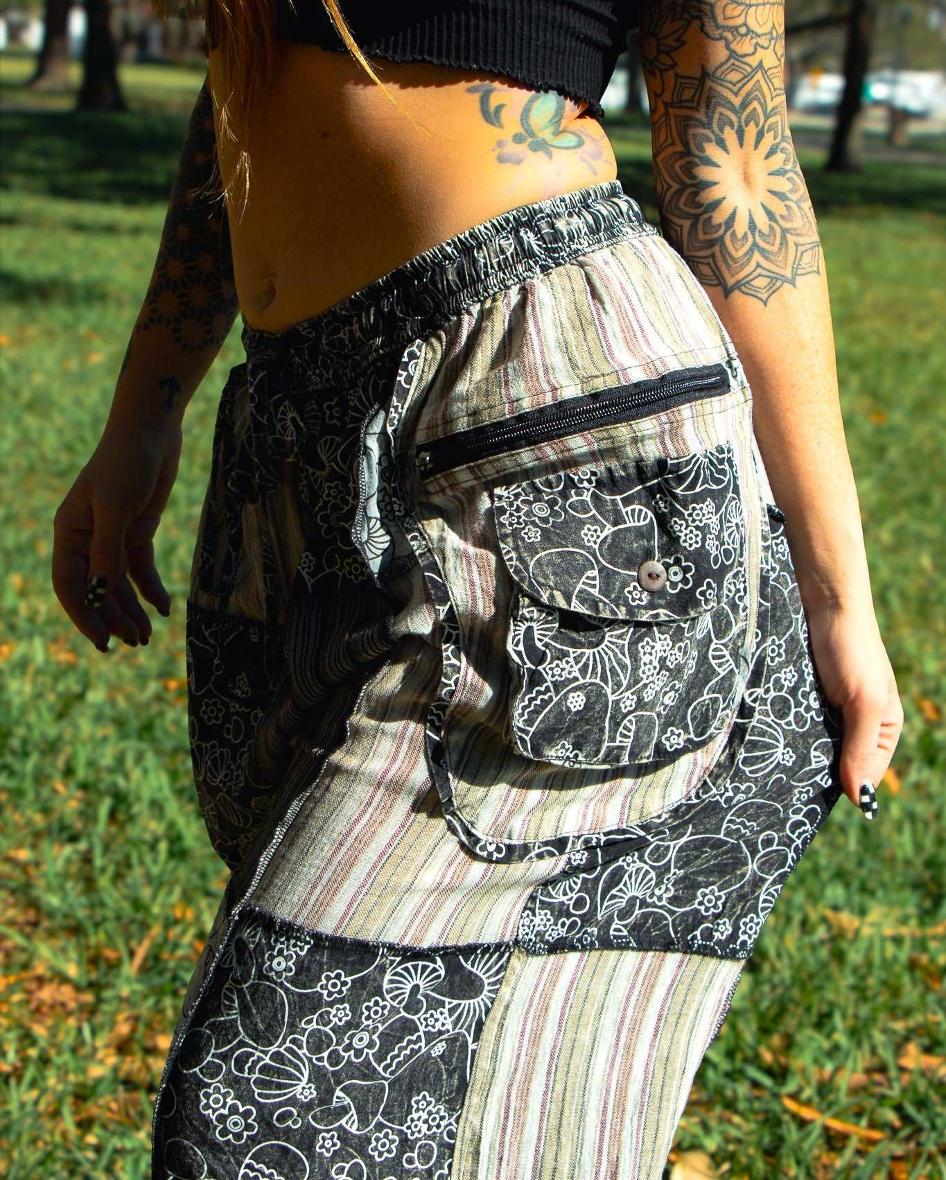 Flora Pants with mushroom pattern, elastic waist, zippered pocket, patchwork design.
