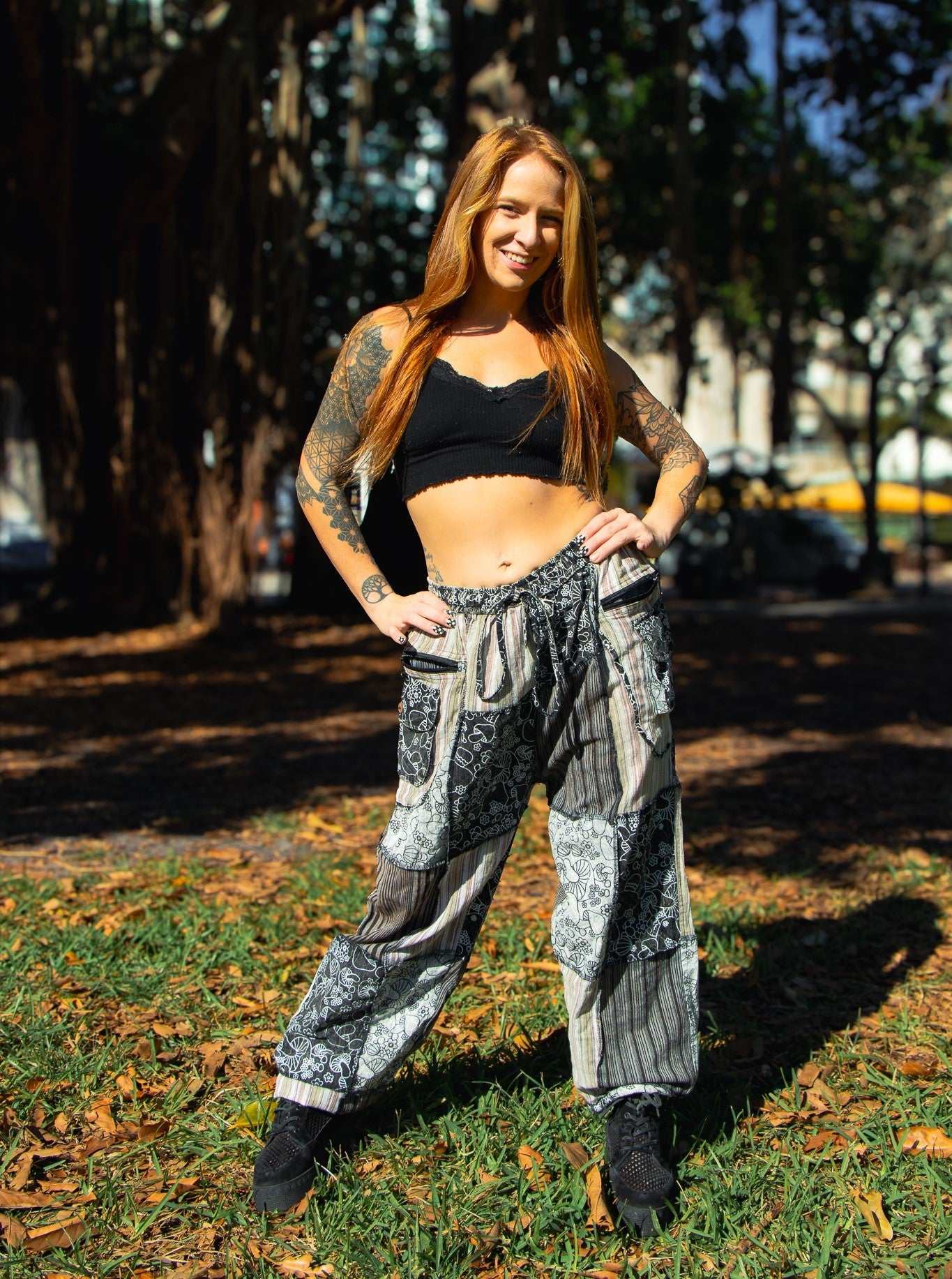 Flora Pants with mushroom pattern, elastic waist, zippered pocket, and patchwork design.