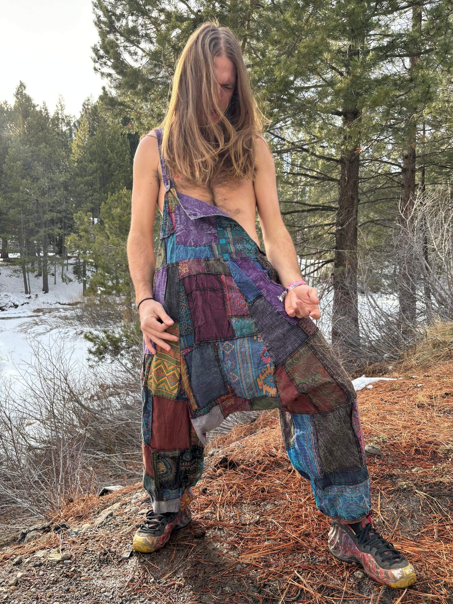 Patchwork Harem Overall with adjustable straps, displayed outdoors.