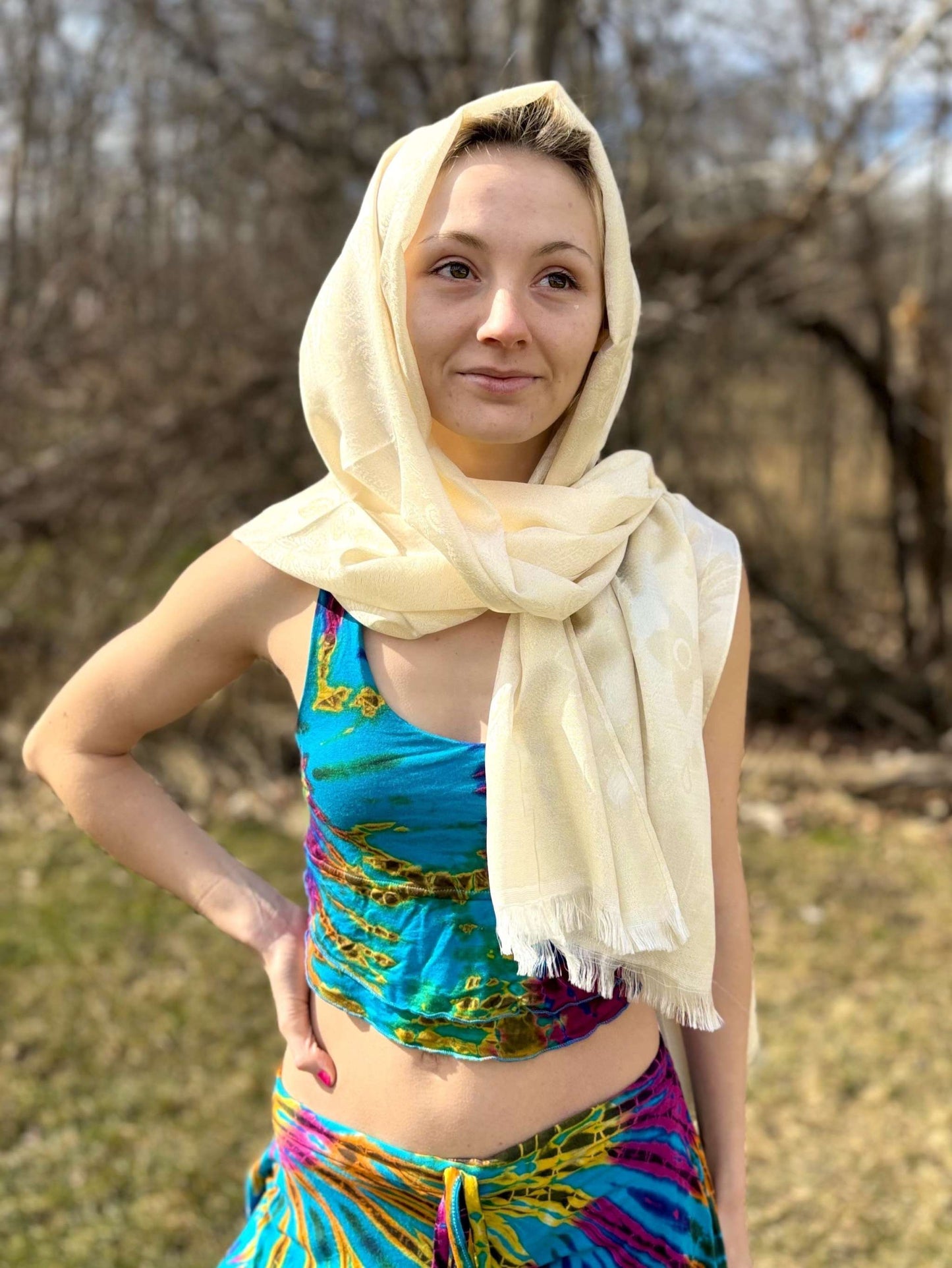 Delicate Lace Pashmina in cream color worn by a woman outdoors.