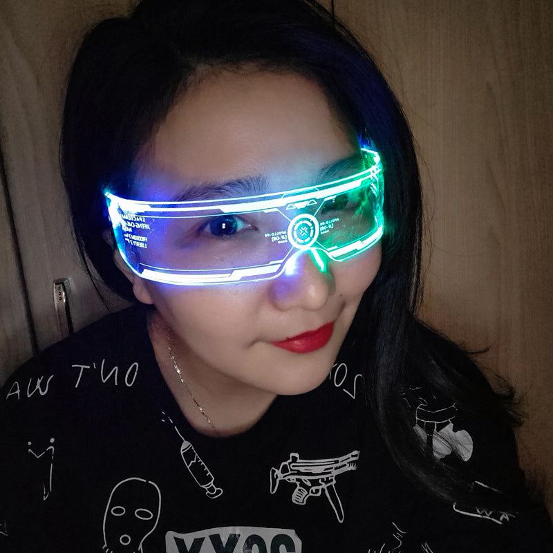 Colorful futuristic glasses with LED lights worn by a person, showcasing a unique, stylish design.