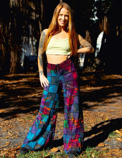 Handcrafted palazzo pants with vibrant patterns, 95% rayon, drawstring.