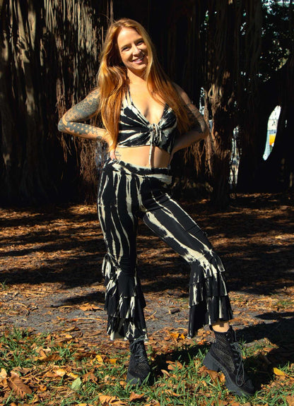 Ruffle bottom pants with unique dye patterns and elastic fit.