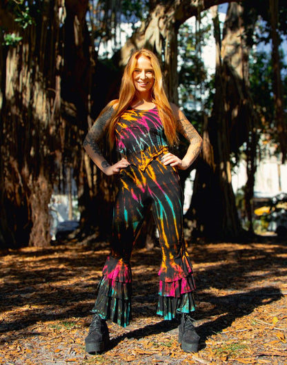 Ruffle bottom pants with colorful dye patterns and unique handcrafted design.