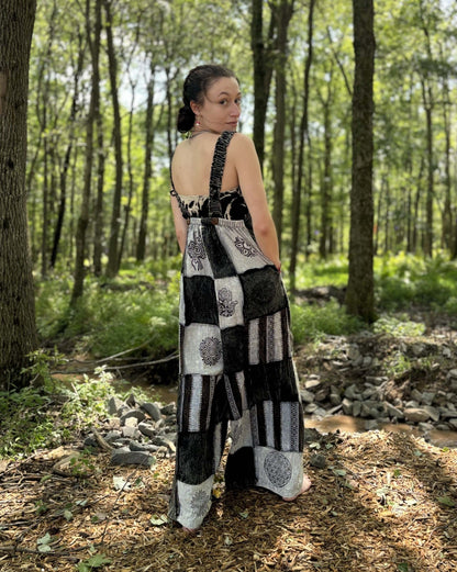 Black & White Patchwork Overalls with unique hand-printed patches, palazzo legs, and adjustable straps, made from 100% cotton.