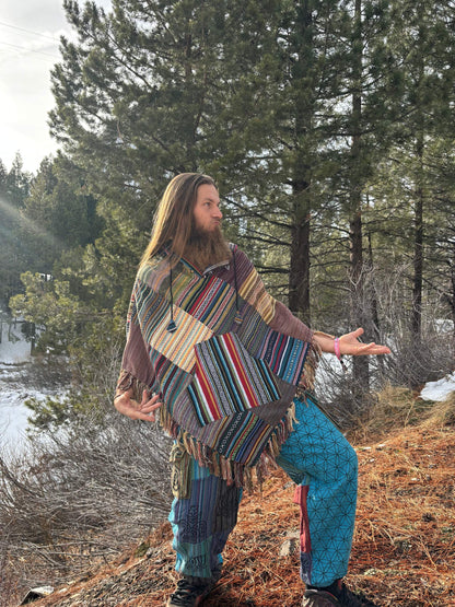 Cotton Patchwork Poncho with wooden toggle buttons, handmade in Nepal, worn by a person outdoors.