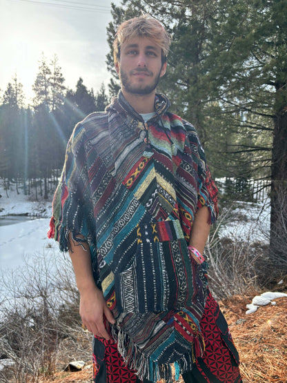 Fleece Patchwork Poncho with wooden toggle buttons for warmth and style.