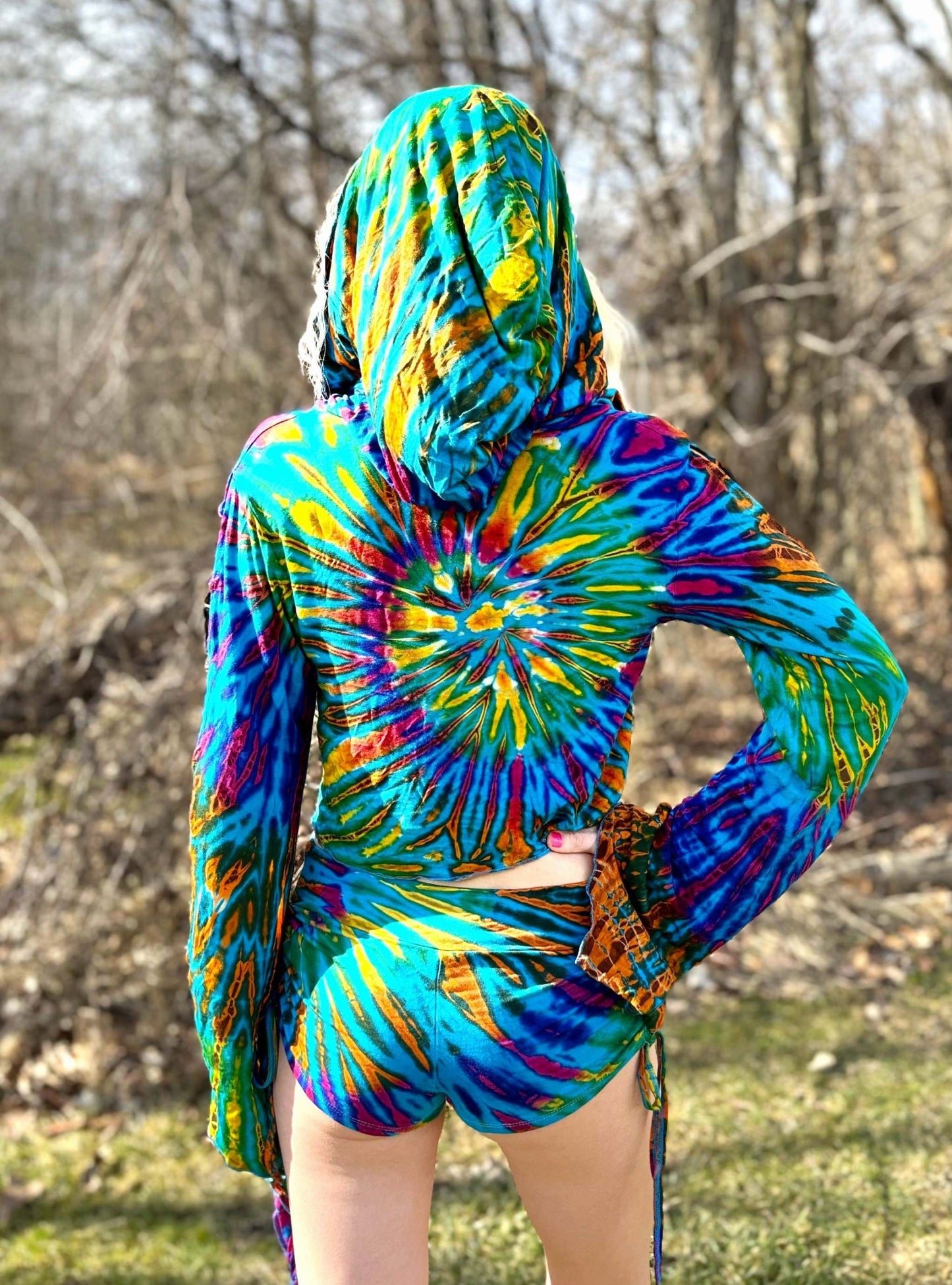 Calypso top with elven hood and vibrant tie-dye design.