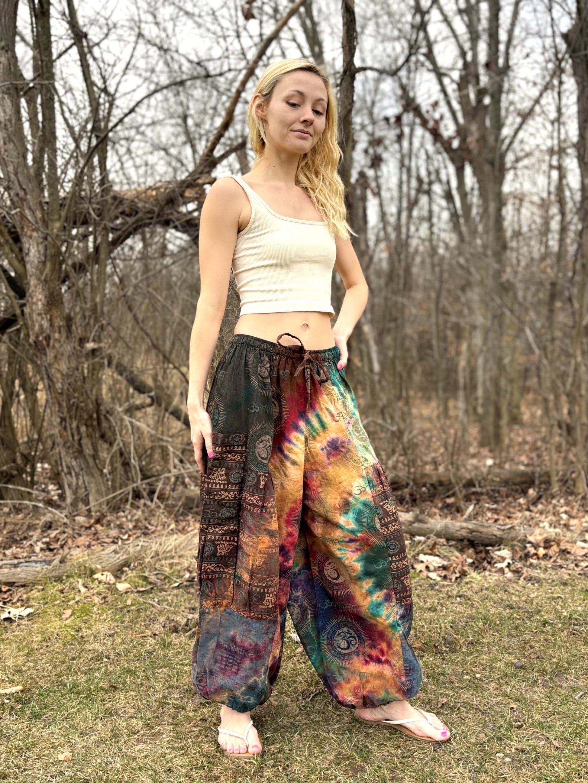 Wide leg Thai Dye Harem pants with unique tie-dye pattern, elastic waistband, and ankle cuffs.