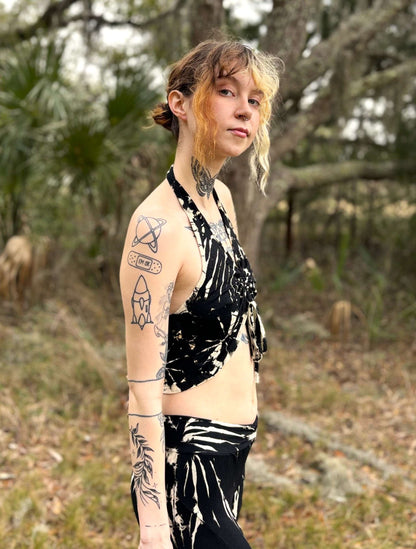 Hand-dyed fairtrade Kai ruffle ruchet drawstring top in black and white.