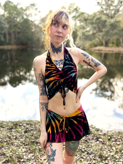 Kai hand-dyed ruffle ruchet drawstring top in multiple colors, worn by a model outdoors.