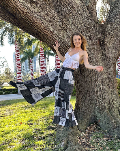 Ares Patchwork Pants with black and white patchwork design, 100% cotton, elastic waistband.